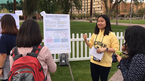 Yuanru Tan presenting a poster at the Learning Analytics & Knowledge conference