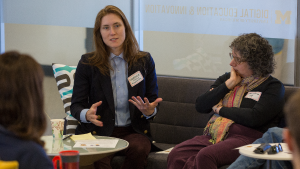 Stephanie Rosen speaking while sitting down and Jane Berliss-Vincent listening while seated