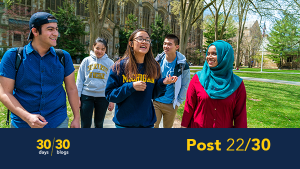 Photo of a diverse group of students walking and smiling in the University of Michigan Law quad including a lower-third with the words "30 posts in 30 days" and "post 22 of 30."