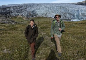 University of Michigan College of Engineering student Abigail Meyer (left) and Mark Flanner (right), associate professor in Climate and Space Sciences and engineering in the University of Michigan College of Engineering, in front of the Russell Glacier in Greenland.