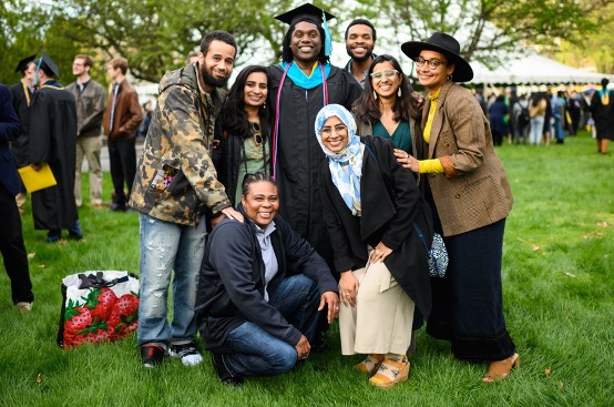 Marcus Hall at his graduation with friends and family